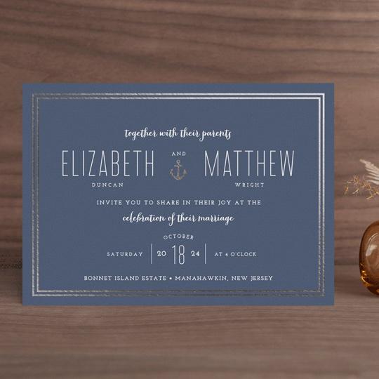 Playful white type on navy background with gold anchor and border