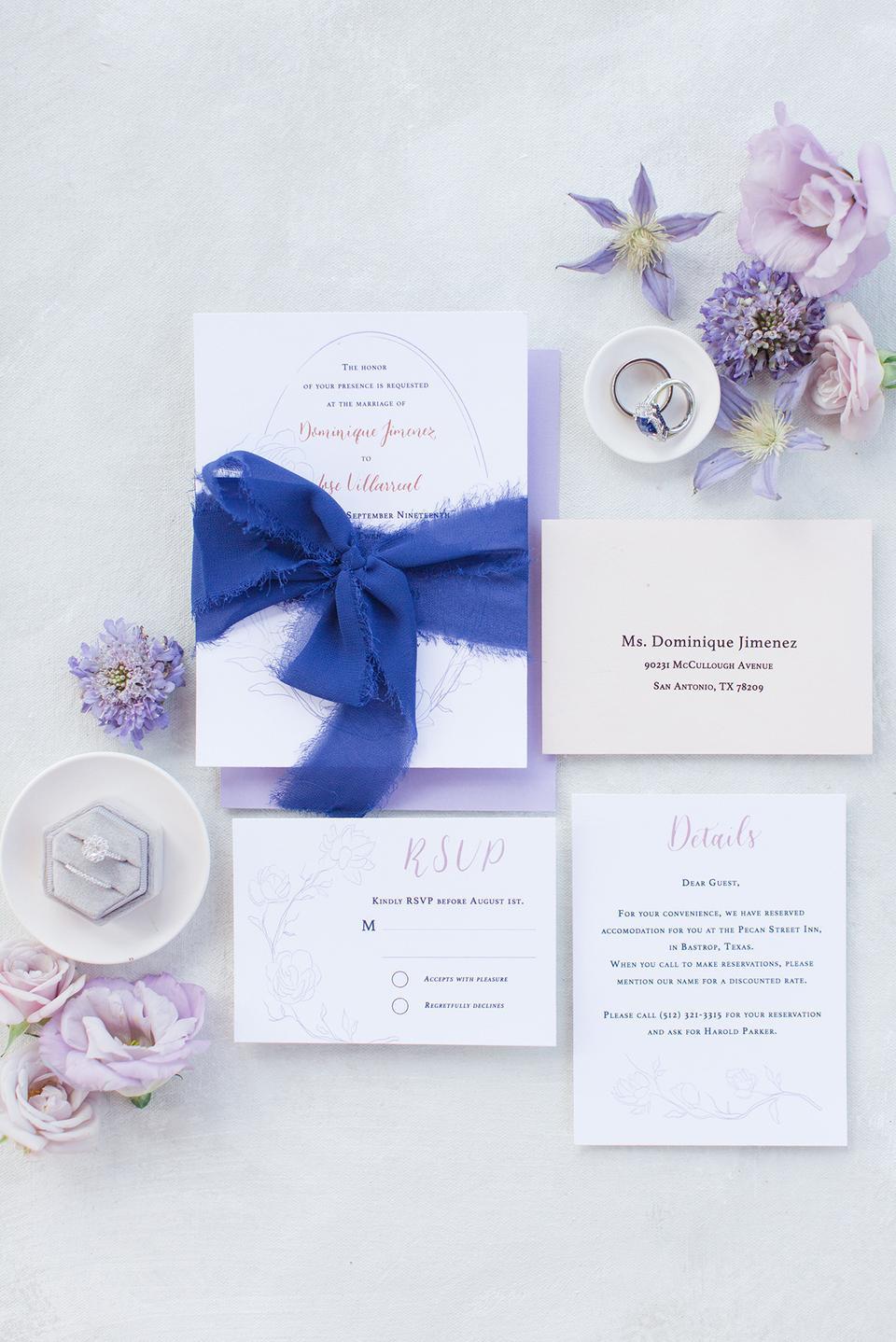 purple wedding flower idea very peri wedding invitations with purple flowers including roses, clematis, and lisianthus